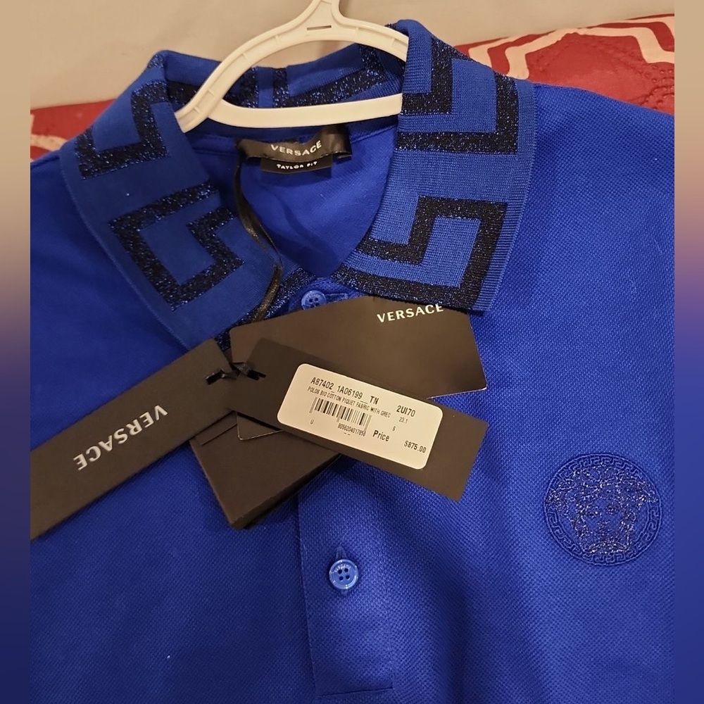 Men’s Versace shirt size small runs big. new with tags selling for half price